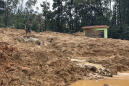 Vietnam landslide hits army camp, buries 22 personnel