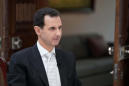 Syria's Assad says will visit North Korea, news agency reports