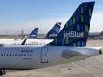 JetBlue flight evacuated at Newark Airport after suicide vest photo AirDropped to passenger iPhones