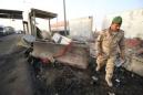 Two suicide car bombs explode on highway near oilfields in southern Iraq