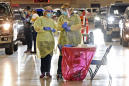 Hospitals feel squeeze as coronavirus spikes in Midwest