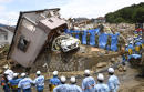 Rescuers search for dozens still missing after Japan floods