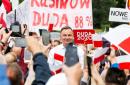 Polish conservative Duda re-elected president, deeper EU rifts likely