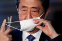 Rare online outrage in Japan forces Abe to delay controversial bill