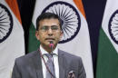 India returns key diplomat to Pakistan as tensions ease