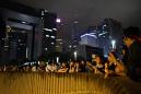 Hong Kong protesters begin night vigil as extradition anger mounts