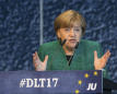 Merkel supports German coalition with Greens, Free Democrats