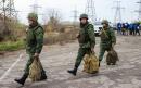 Government troops and separatists begin joint withdrawal in eastern Ukraine town