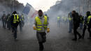 French Police Fire Tear Gas As Yellow-Vested Protesters Swarm Paris