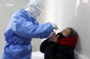Coronavirus: Big jump in new cases, deaths declared as diagnosis method is tweaked