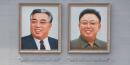 A North Korean woman is under investigation after saving her 2 kids from a house fire — but not her portraits of the Kim family
