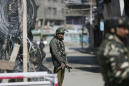 The Latest: Pakistan arrests key suspects in Kashmir attack