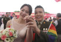 Two same-sex couples in military marry in first for Taiwan