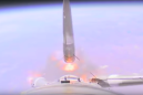 Turbulent video shows the moment a Russian rocket failed, sending two astronauts back to Earth