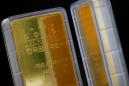 Gold eases on buoyant dollar as U.S. stimulus bets fade