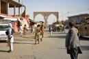 Taliban kill 21 Afghan security forces, threaten city: official