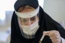 Iran says virus deaths rise 92 to 4,869
