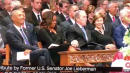 Did George W. Bush Just Sneak Michelle Obama A Piece Of Candy At McCain's Funeral?
