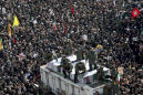 Throngs mourn, Iranian leader weeps for general slain by US