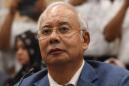 Malaysia's scandal-mired Najib hit with travel ban after poll loss