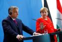 Germany's Merkel, Hungary's Orban clash over how to be humane