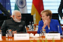Merkel wants to foster India ties, softens message on U.S. as Trump scolds