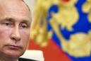 Putin lifts Russia's shutdown, but keeps many restrictions