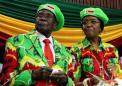 Zimbabwe's Mugabe widens purge, clearing wife's succession path