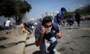 Violence spills over in heart of Caracas as thousands answer Guaidó's call