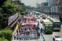 Duterte fans, foes in mass Manila rallies