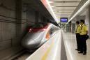 Fear and fanfare as Hong Kong launches China rail link