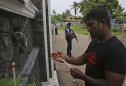 The Latest: Sri Lanka emergency law bans face coverings